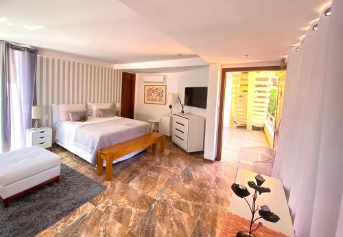 Cama o camas de una habitación en Charme Pousada Boutique & Spa