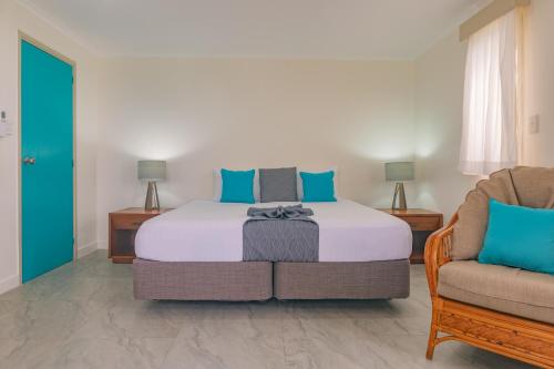 Cama ou camas em um quarto em Moana Sands Beachfront Villas