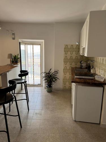 Una cocina o zona de cocina en Maria Suite Home