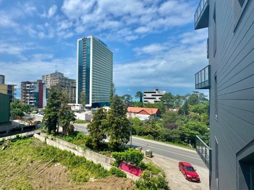 a view of a city from a building at Gonio Studio in Batumi in Kvariati