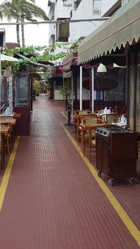 A restaurant or other place to eat at Stylish Apartment