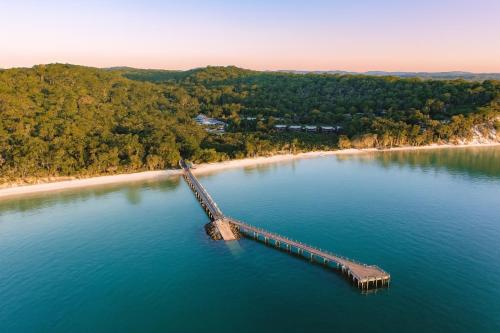 an aerial view of a bridge over a body of water at Sapphire Villa 535, Kingfisher Bay Resort, K'gari in K'gari Island (Fraser Island)