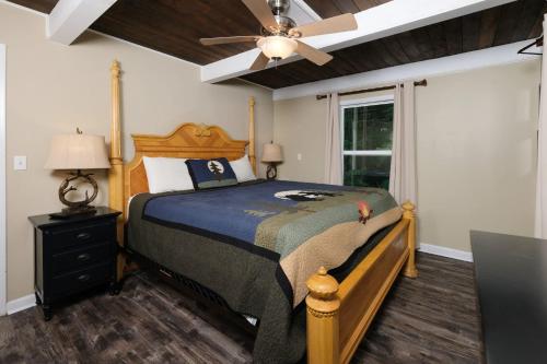 a bedroom with a bed and a ceiling fan at Heavenly View 2308 in Gatlinburg