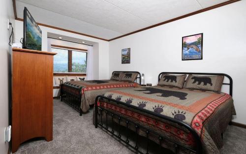 En eller flere senge i et værelse på Memory Maker - GB