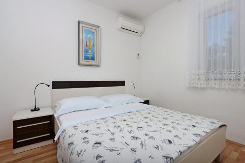 Apartments by the sea Banjol, Rab - 12838