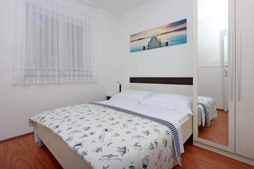 Apartments by the sea Banjol, Rab - 12838