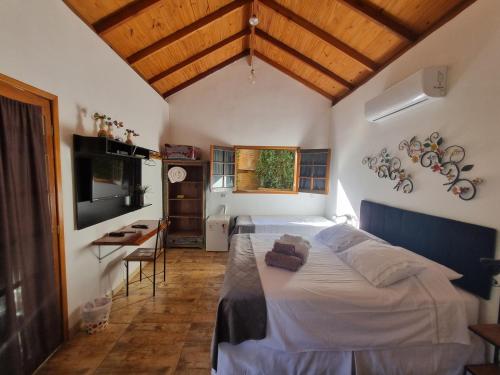Ένα ή περισσότερα κρεβάτια σε δωμάτιο στο Pousada Villa dos Quilombolas