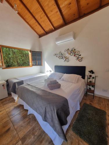 Ένα ή περισσότερα κρεβάτια σε δωμάτιο στο Pousada Villa dos Quilombolas