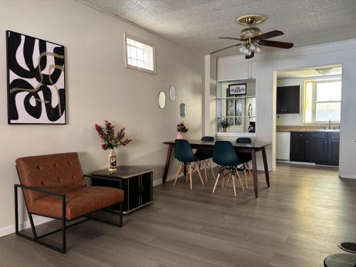 a living room with a dining room table and chairs at Cozy Corner Home Stay in Philadelphia