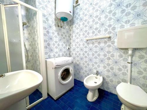 Koupelna v ubytování Apartment in Porto Santa Margherita