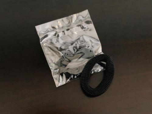 a plastic bag with a black handle on it at Graces Hotels in Inzai