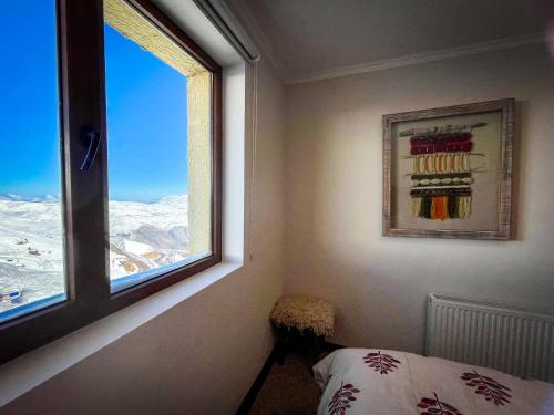 Katil atau katil-katil dalam bilik di HOM I Edif Valle Blanco 3D2B jacuzzi SKI IN y OUT VB104