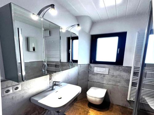 Ένα μπάνιο στο Apartment in Adenau