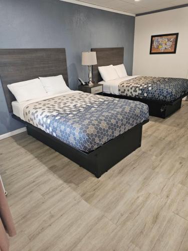a hotel room with two beds in a room at The Edyn Motel in Wytheville