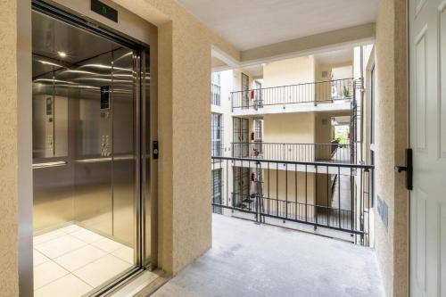 a glass door in a building with a balcony at 10 minutes away from Zocalo in Mexico City