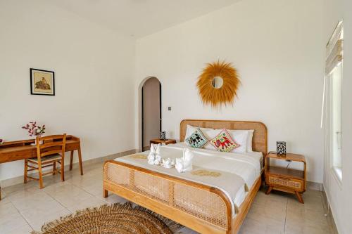 Ένα ή περισσότερα κρεβάτια σε δωμάτιο στο Villa Curves Bali