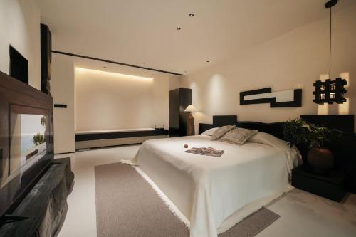 Una cama o camas en una habitación de JIYU Hotel