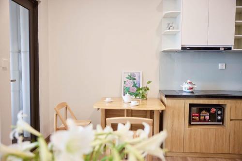 Kuchyň nebo kuchyňský kout v ubytování Studio R2 - Onsen Ecopark Hà Nội