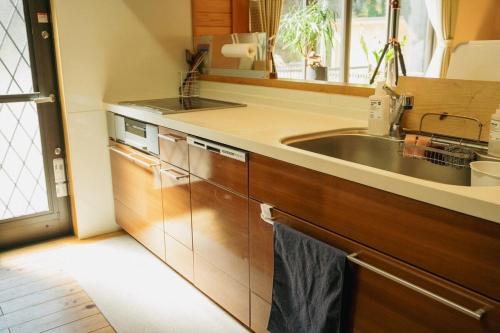 Kuchyň nebo kuchyňský kout v ubytování Keiryuso