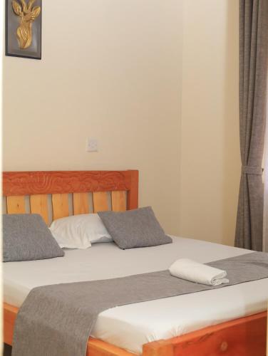 Postel nebo postele na pokoji v ubytování Beach View Bustani