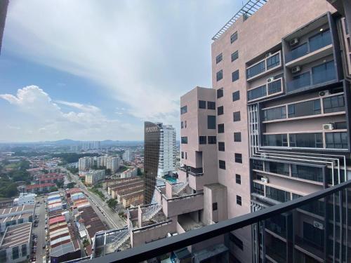 a view of a city from the balcony of a building at Imperio Residence Melaka by Jeffery Lam Home Management in Melaka
