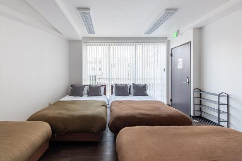Tomihisa House 8-minute walk from the nearest station Only 5 minutes by train to Shinjuku