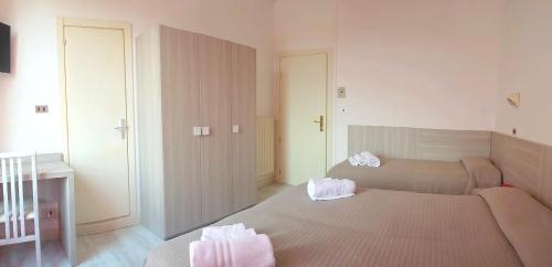 Postel nebo postele na pokoji v ubytování Hotel Verde Luna