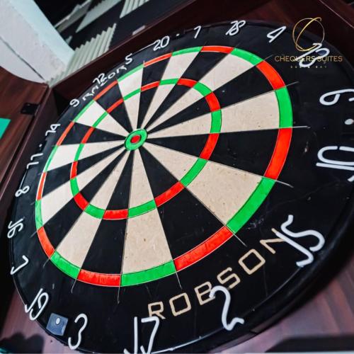 a close up of a dart board with a dart at Chequers Suites Subic Bay in Olongapo