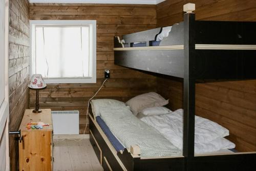 Ένα ή περισσότερα κρεβάτια σε δωμάτιο στο Modern Family Cabin With Views Of Spåtind