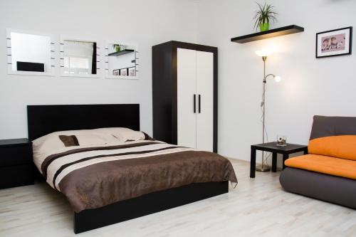 Cama o camas de una habitación en Leo Apartment