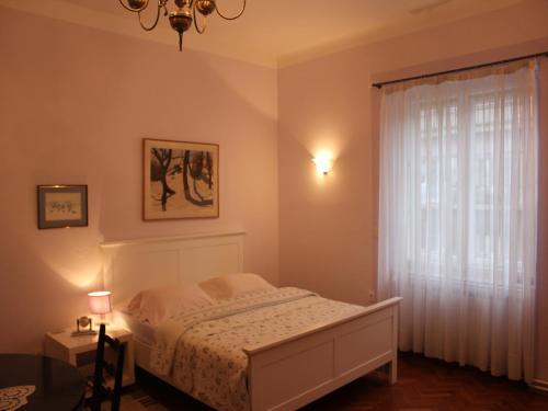 Postel nebo postele na pokoji v ubytování Apartments ABA Zagreb