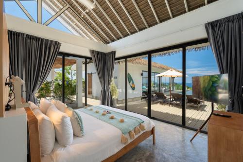Postel nebo postele na pokoji v ubytování Pahili Pool Villas Koh Phangan