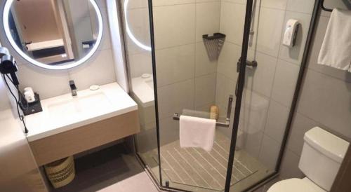 Ένα μπάνιο στο GreenTree Inn Suzhou Industrial Zone Yangcheng Lake Weiting Mong Kok Express Hotel
