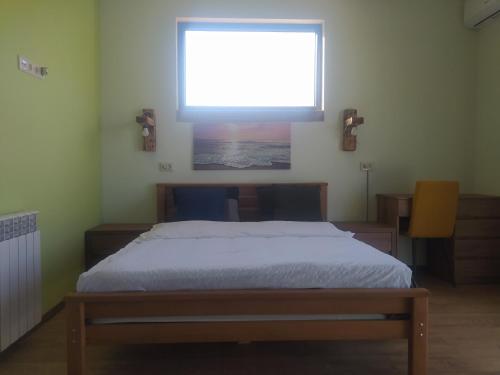 Postel nebo postele na pokoji v ubytování Hotel Shindisi Inn Tbilisi