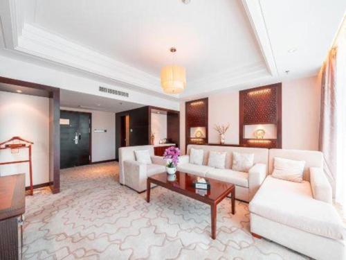 Χώρος καθιστικού στο Huangshan Shuguang Yusong Hotel