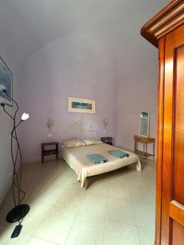Postel nebo postele na pokoji v ubytování Casa di Rosa Chiara
