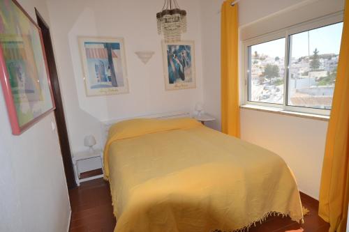 Ένα ή περισσότερα κρεβάτια σε δωμάτιο στο Apartments Miramare Miramonte
