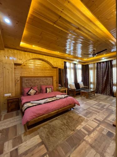 Postel nebo postele na pokoji v ubytování Nubra House
