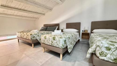 Postel nebo postele na pokoji v ubytování Kyansa Sicily a Pachino