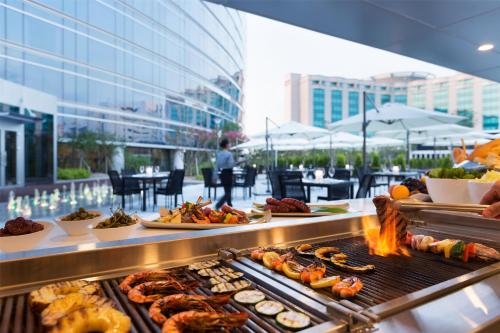 a buffet with many different types of food on display at Grand Hyatt Incheon in Incheon