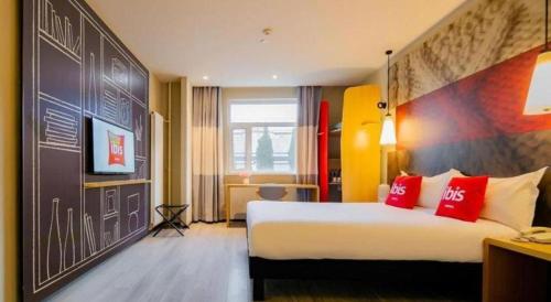 Ένα ή περισσότερα κρεβάτια σε δωμάτιο στο ibis Xi'an First Gaoxin RD