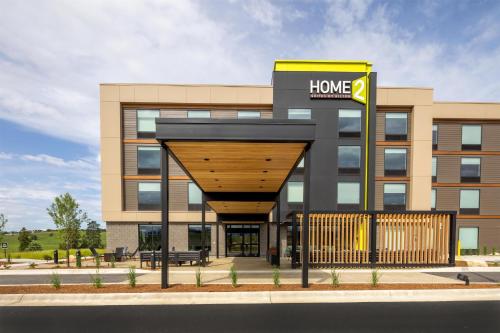 a building with a home sign in front of it at Home2 Suites By Hilton Kalispell, Mt in Kalispell