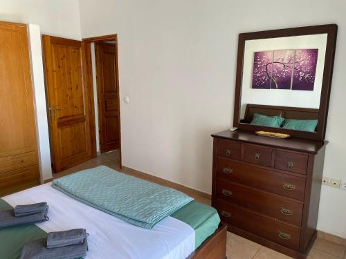 Postel nebo postele na pokoji v ubytování Olea Apartment