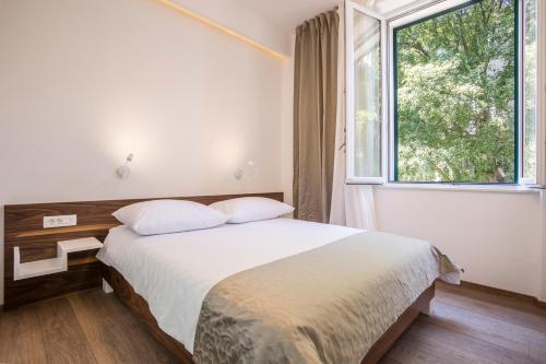 Posteľ alebo postele v izbe v ubytovaní Luxury Accommodation Marino
