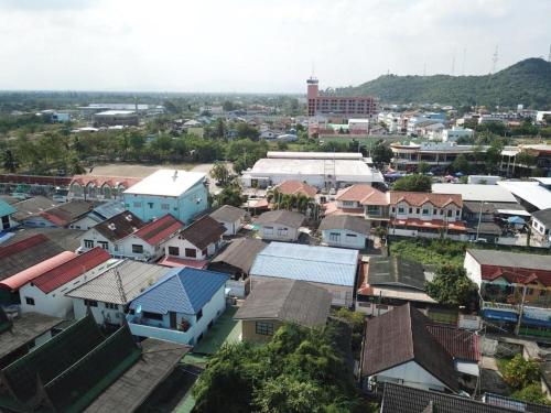 an aerial view of a town with houses at Thanyachatra Boutique. in Phetchaburi