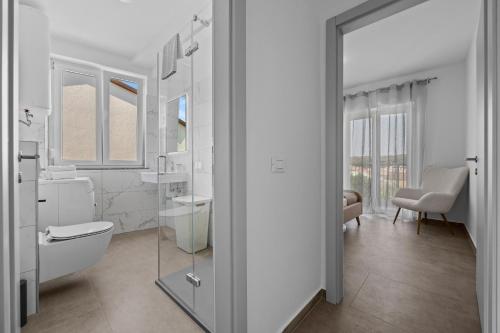 Koupelna v ubytování Apartmani Paliska