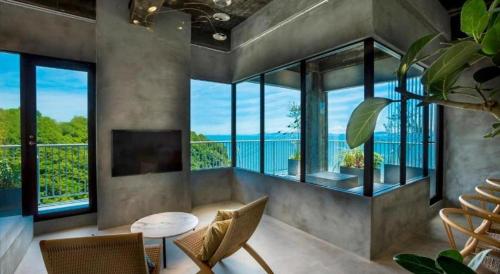 a living room with a view of the ocean at MISAKI TERRACE in Ako
