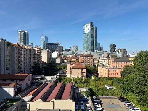 a view of a city with tall buildings and cars at Enjoy Milano Skyline in Milan