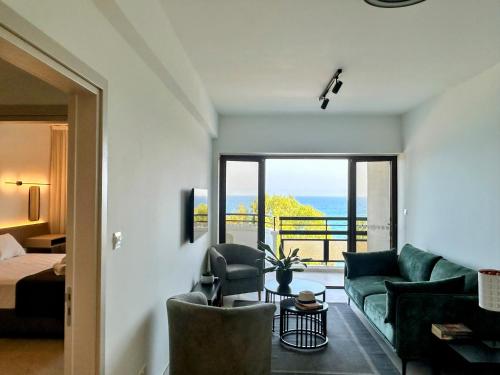 Postel nebo postele na pokoji v ubytování Pigeon Beach Hotel Apartments