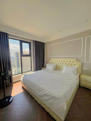 Ένα ή περισσότερα κρεβάτια σε δωμάτιο στο Amanda Apartment Quy Nhon